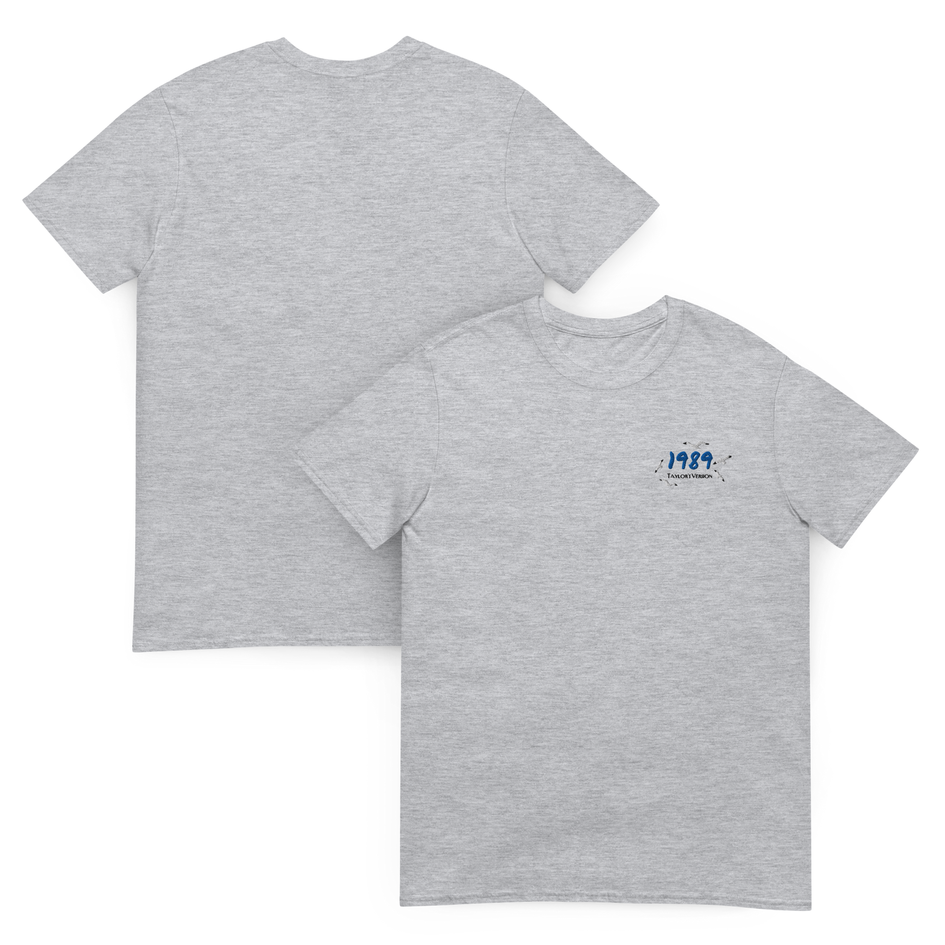 Grey Taylor Swift 1989 (Taylor’s Version) t-shirt featuring a minimalist chest print with blue “1989” lettering and seagull details. Soft unisex tee inspired by Taylor Swift’s 1989 album, perfect for Swifties, concert outfits, and casual pop music streetwear looks