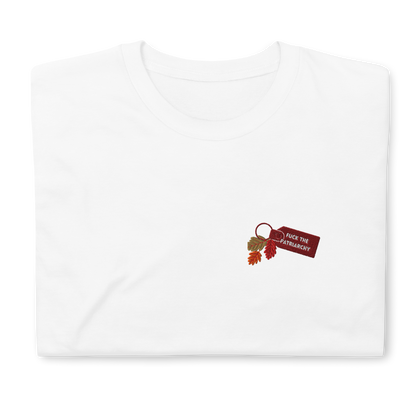White t-shirt with small embroidered “Fuck the Patriarchy” keychain design and autumn leaves inspired by Taylor Swift’s All Too Well lyric, minimalist Swiftie fan shirt
