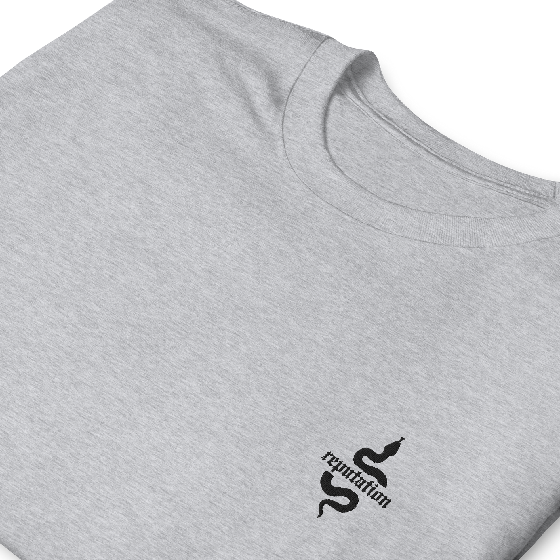 Grey Taylor Swift “Reputation” graphic t-shirt featuring iconic bold black snake logo inspired by the Reputation album era, official fan merch for Swifties