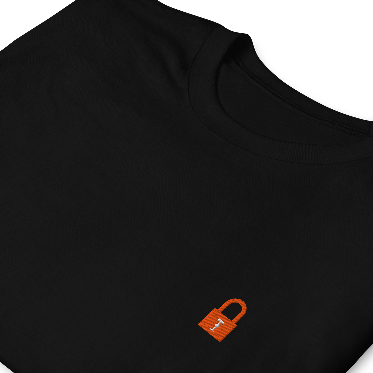 Taylor Swift Showgirl era inspired black t-shirt with minimalist lock graphic, aesthetic Swiftie fan merchandise tee