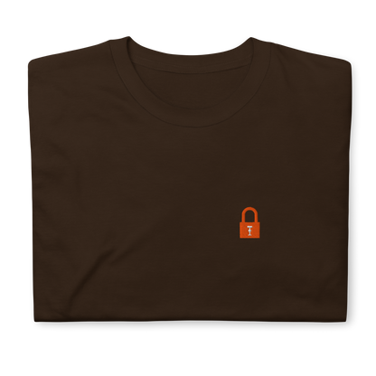 Taylor Swift Showgirl era inspired brown t-shirt with minimalist lock graphic, aesthetic Swiftie fan merchandise tee