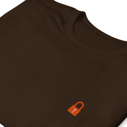 Taylor Swift Showgirl era inspired brown t-shirt with minimalist lock graphic, aesthetic Swiftie fan merchandise tee