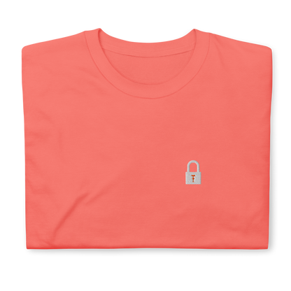 Taylor Swift Showgirl era inspired coral t-shirt with minimalist lock graphic, aesthetic Swiftie fan merchandise tee