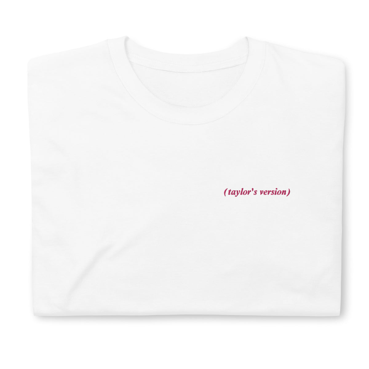 White t-shirt with "(taylor's version)" embroidered in script text